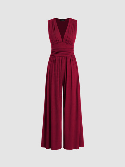 Mono Negro Elegante con Escote en V y Pierna Ancha